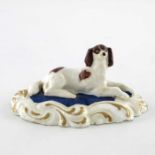 19th Century Staffordshire porcelain model of a Spaniel