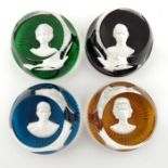 Baccarat, four cameo paperweights of royal family members, various colours, dated 1976, stamped vers