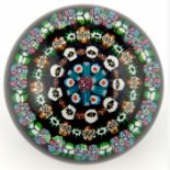 Paul Ysart, concentric millefiori paperweight with short radiating blue and light blue canes, unsign
