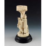 A 19th century Indian carved ivory figure group,