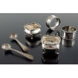 A pair of George V silver salts, Walker and Hall, Sheffield 1917, together with napkin rings