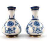 William Moorcroft for James MacIntyre, a pair of Aurelian blue and white poppy vases
