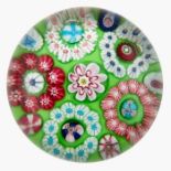 Clichy, patterned millefiori paperweight, large central pink and white cane