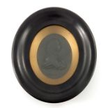 Wedgwood and Bentley, a black basalt relief moulded portrait plaque of Charles Pratt, Lord Camden