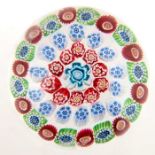 Baccarat, concentric millefiori paperweight, central complex millefiori cog cane, surrounded red by