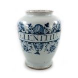 A London Delft drug jar, ovoid form, circa 1740, decorated in blue with a scrolling strapwork label