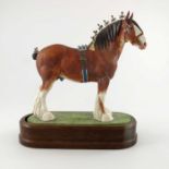 Doris Lindner for Royal Worcester, a porcelain model of a Clydesdale Stallion, 1976, raised on oval