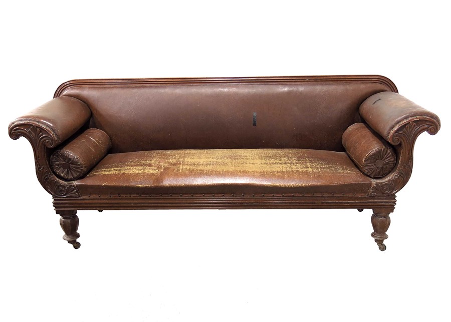 An early Victorian carved walnut sofa,