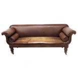 An early Victorian carved walnut sofa,