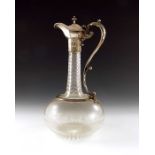 A Victorian silver plate and cut glass claret jug