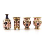 Four Royal Crown Derby Imari 1128 miniature vases