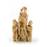 A 19th century Japanese ivory okimono figure group