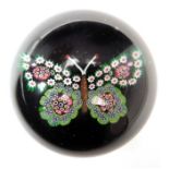 Paul Ysart, millefiori butterfly on black ground, with copper aventurine body, signed PY edge of win