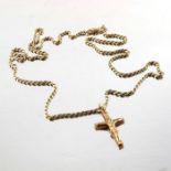 A 9 carat gold crucifix pendant on chain