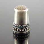 David Andersen, a Norwegian silver and enamelled, jade set thimble