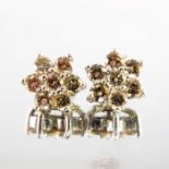 A pair of diamond cluster stud earrings