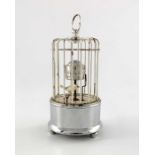 A Kaiser novelty chrome plated birdcage alarm clock
