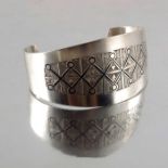 A Scandinavian Modernist white metal and enamelled bangle