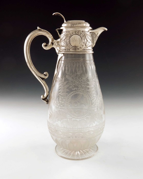 A Victorian silver and etched glass claret jug, W and G Sissons, Sheffield 1873