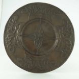 An Arts and Crafts copper plaque