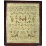 A 19th century sampler by Ann Sarah Coleman, aged 10, 1804, worked in cross stitch and needlework wi