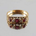 An 18 carat gold ruby and diamond ring