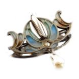 A Jugendstil plique a jour enamelled silver and pearl brooch,