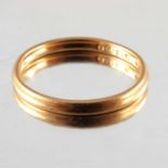 A 22 carat gold wedding band