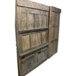 A large part 17th century carved and panelled oak screen