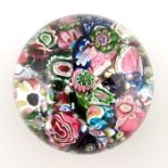 Clichy, scrambled paperweight, containing irregular canes and coloured cable, circa 1850, polished b