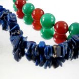 A Lapis Lazuli rough stone necklace, together with a green and red hardstone necklace