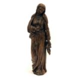 A large late 17th century carved figure of Mary, possibly originally part of a crucifixion cross,