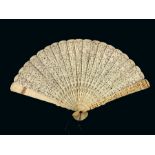 A Chinese carved ivory brise fan (中国雕花象牙扇), 19th century