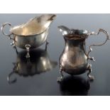 A Victorian silver cream jug and a George V silver sauce boat, Stokes and Ireland Ltd., Birmingham 1