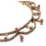 A late 19th century gold, ruby and diamond garland necklace