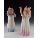 A pair of Gebruder Heubach bisque figures of young children playing