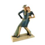 Elly Strobach for Royal Dux, an Art Deco figure group of strolling man and woman