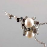 An 18ct gold pearl, diamond, blue topaz and amethyst necklace