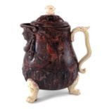 A Staffordshire Agateware coffee pot, circa 1750s