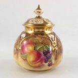 S Drysdale, for Royal Worcester, a pot pourri vase and cover, circa 1970, painted with fallen fruit