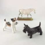 A Royal Doulton figure of a horse and two other figures