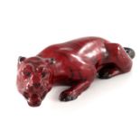 Charles Noke for Royal Doulton, a Flambe Snarling Tiger figure