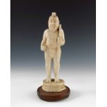 A 19th century Indian carved ivory figure of a Hindu hunter