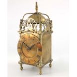 A 17th century style brass lantern clock timepiece