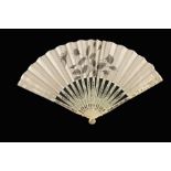 λ Three mid-18th century ivory fans, the first with double paper leaf, the upper guards carved deepl