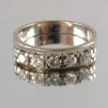 An 18ct gold diamond half eternity ring