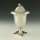 An Edwardian silver sauce urn, Edward Barnard and Sons, London 1903