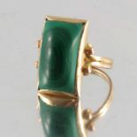 A malachite cabochon single-stone ring