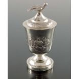 A Chinese export silver egg cup and cover