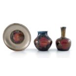 William Moorcroft, a small Pomegranate on ochre bottle vase,